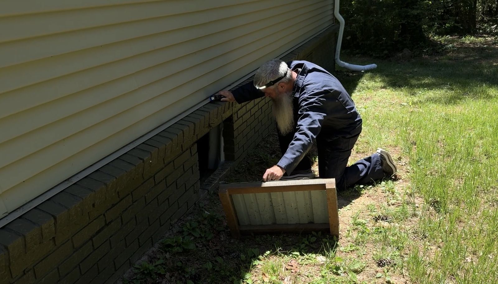 Jon Harris evaluating the condition of a home during an inspection